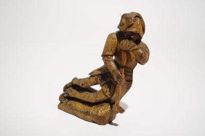Un soldat assis, fragment de retable, chêne et polychrome, Flandres, 16ème