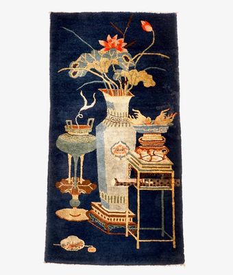 Un tapis Baotou à décor d'antiquités, Chine, 19/20ème