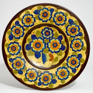 Un très grand plat à décor de fleurs en faïence, Charles Catteau pour Boch Frères Keramis — photo 1