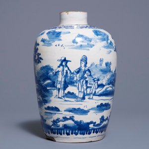 Un vase en faïence de Delft bleu et blanc à décor d'un couple avec enfant, 1ère moitié du 18ème — photo 1