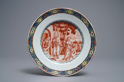 Une assiette en faïence polychrome de Delft petit feu à décor religieux, 18ème
