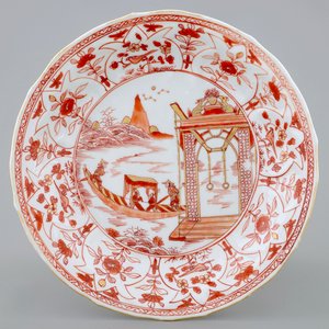 Une assiette en porcelaine de Chine à décor en lait et sang d'un paysage riverain, Kangxi — photo 1