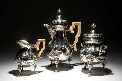 Une cafetière et un cremier aux anses en ivoire et un pot à sucre en argent, style Louis XVI, marques de J. Roelandts, Gand, 1779