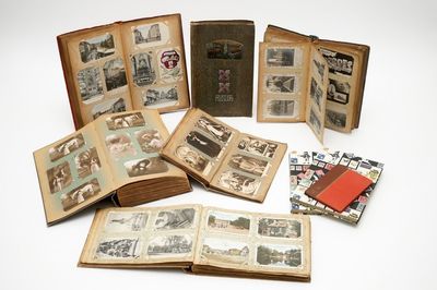 Une collection de cartes postales dans six albums et trois albums de timbres, 19/20ème