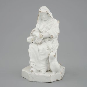 Une damme assise en faïence blanche monochrome, 18ème, poss. Bruxelles — photo 1