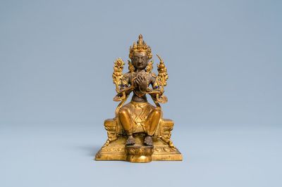 Une figure de Bouddha en bronze doré et incrusté, Chine, 18/19ème