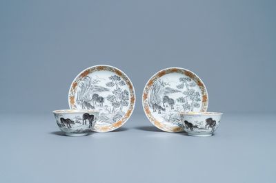 Une paire de tasses et soucoupes en porcelaine de Chine grisaille et doré à décor de buffles, Yongzheng