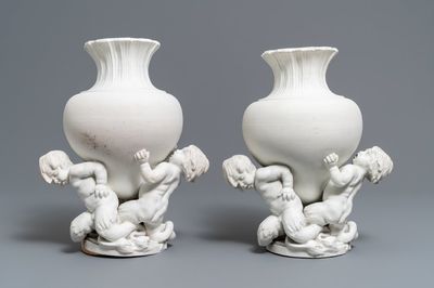 Une paire de vases en biscuit figurant des jeunes tritons, Saint-Amand ou Tournai, 18ème