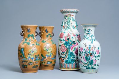Une paire de vases en porcelaine de Chine famille rose à décor appliqué et deux à décor de phénix, 19ème
