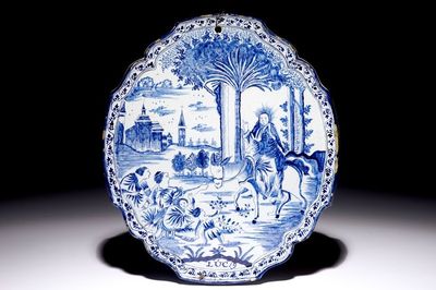Une plaque en faïence de Delft bleu et blanc à décor religieux, 18ème