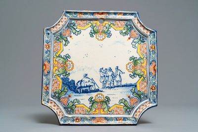 Une plaque en faïence de Delft polychrome à décor de figures dans un paysage, 18ème