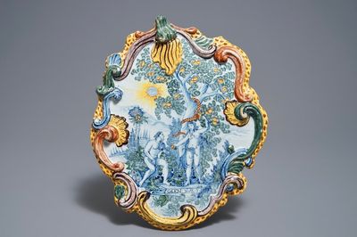 Une plaque en faïence polychrome de Delft à décor d'Adam et Eve, 18ème