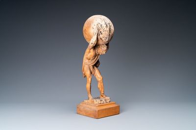 Une statue d'Atlas portant le globe céleste sur ses épaules en tilleul sculpté, Allemagne, vers 1700