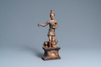 Une statue de Saint Adrien en bois sculpté et polychromé sur socle reliquaire, 17ème