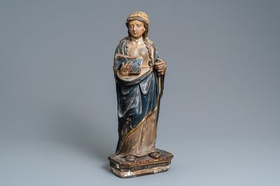 Une statue de Sainte Apolline d'Alexandrie en pierre calcaire sculptée et polychromée, vers 1540