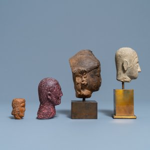 Vier diverse gesculpteerde stenen koppen, 17e eeuw en later — foto 5