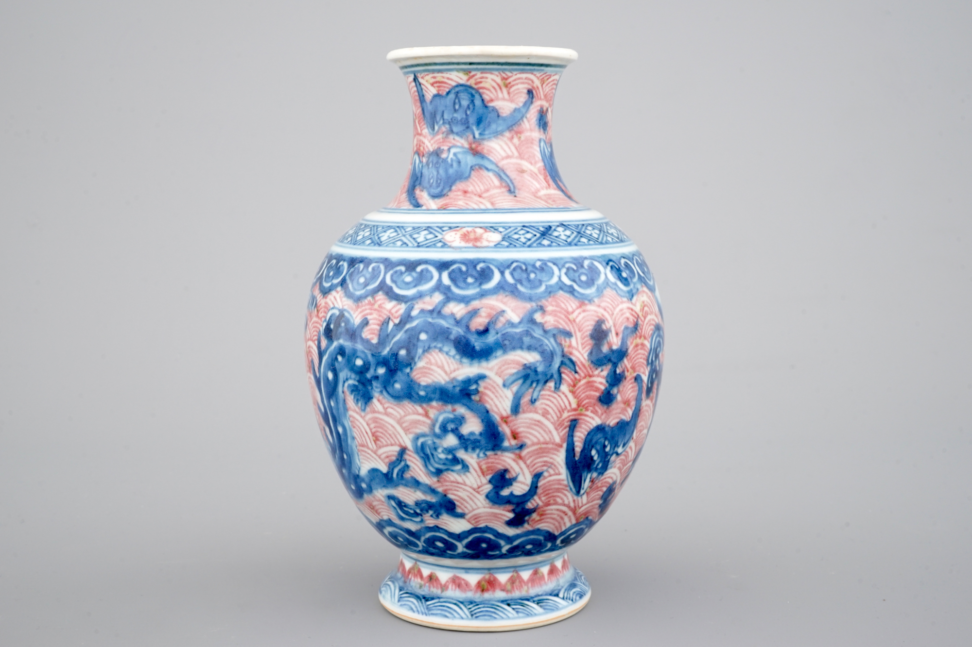 A Chinese porcelain underglaze red and blue dragon vase, 19th C. - Rob ...