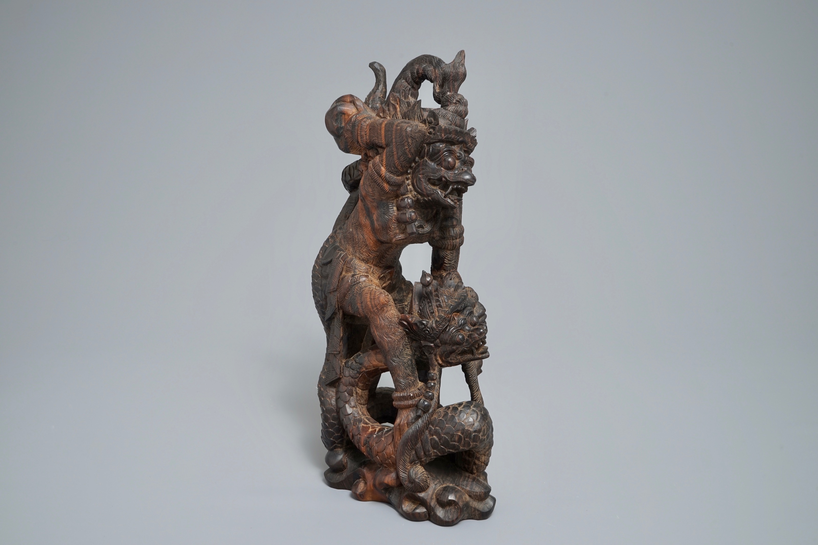 An Indonesian calamandar wooden sculpture of Vishnu riding Naga, 19th C ...