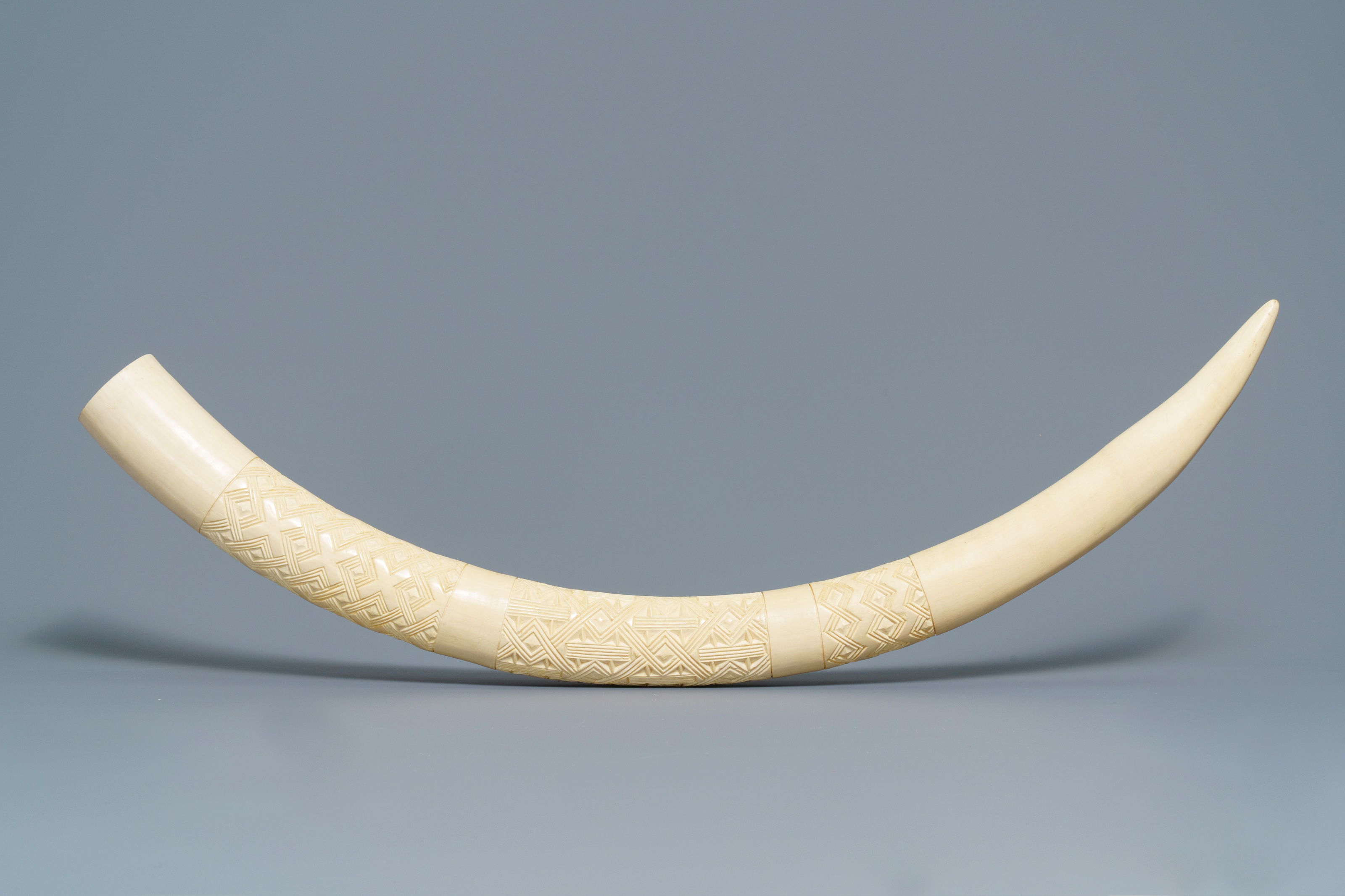 A carved African ivory tusk with ornamental design, Congo, 1st half ...