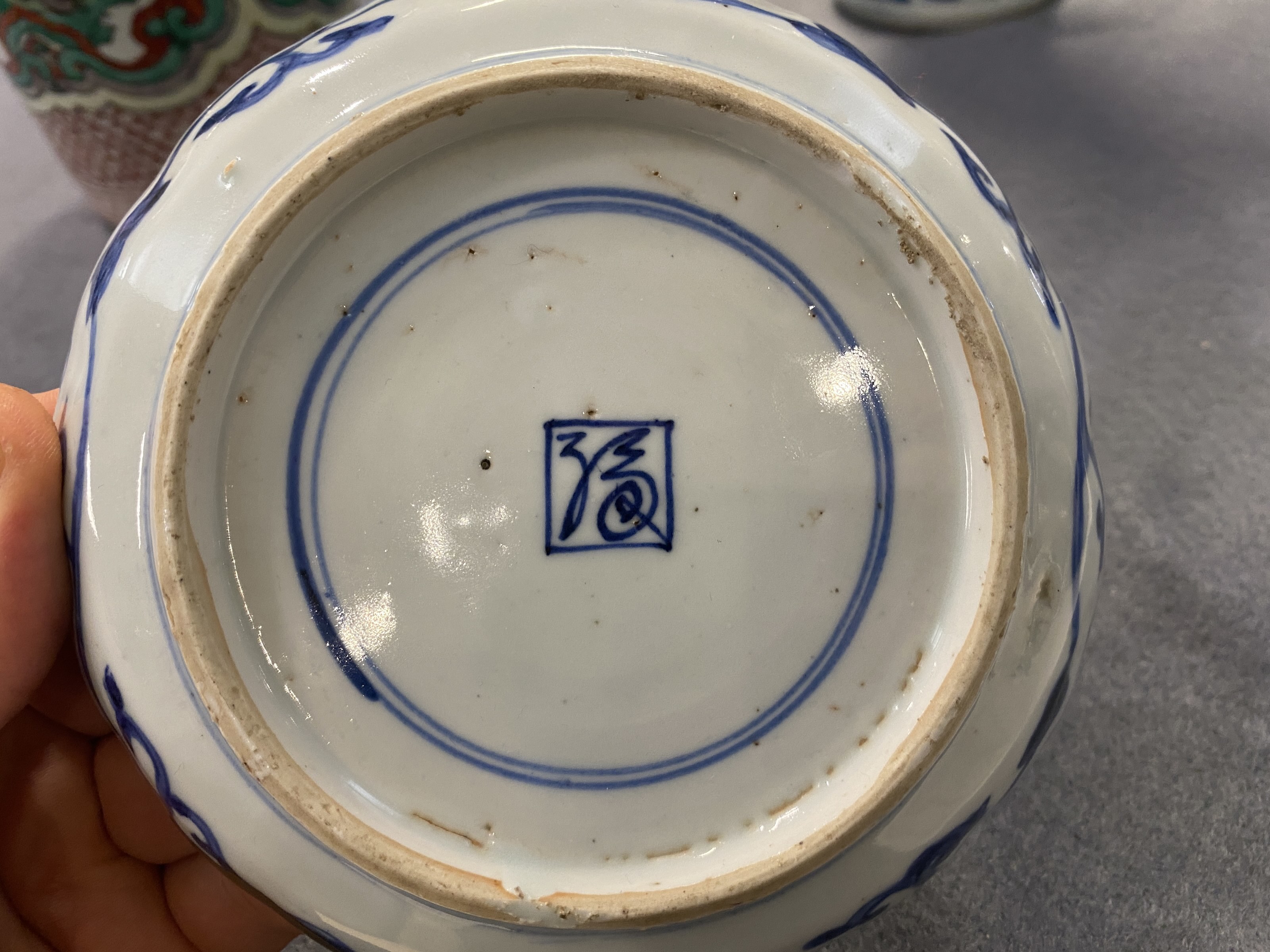 A Chinese blue and white shonzui ko-sometsuke dish with birds and ...