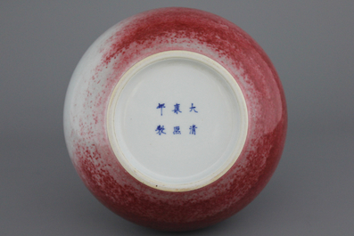 A Chinese porcelain peach bloom bottle vase, Kangxi mark but probably later