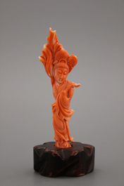 A carved Chinese red coral figure of a Guanyin , 19/20th C.