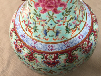 A Chinese porcelain turquoise ground famille rose &quot;Happiness&quot; vase, 20th C.