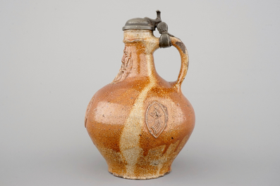 A fine beardman's or bellarmine jug with pewter cover, Raeren, late 16th C.