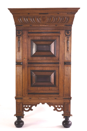 A neo renaissance one door oak cabinet, 19th C.