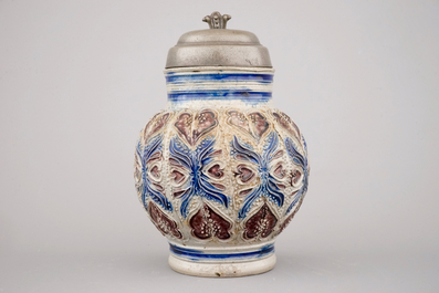 A manganese and blue Westerwald pewter-mounted globular jug, 17th C.