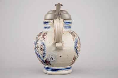 A manganese and blue Westerwald pewter-mounted globular jug, 17th C.