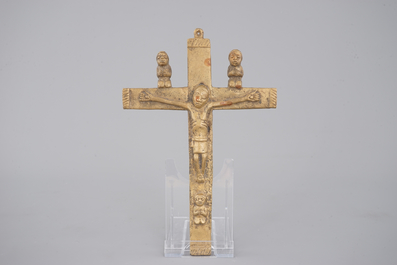 A selection of African bronze bracelets, a crucifix and carved wood figure, 19/20th C.