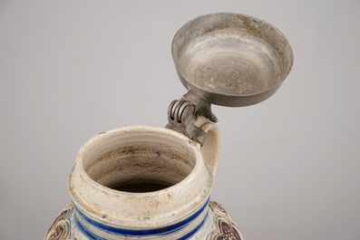 A manganese and blue Westerwald pewter-mounted globular jug, 17th C.