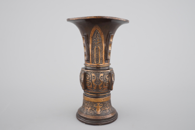 A Chinese archaistic bronze parcel-gilt gu beaker vase, 17/18th C