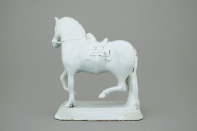 A large white Delft model of a standing horse, 18th C.