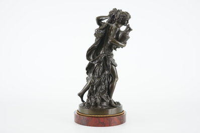 After Claude Michel Clodion (1738-1814), A bronze group of two maenads with a child, 19th C.