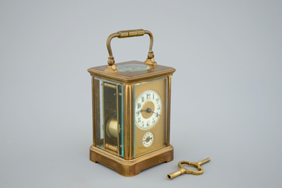 A bronze carriage clock, 19th C., the work signed H. Kreitz, Antwerp