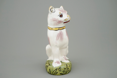 A polychrome Brussels faience model of a cat, 18th C.