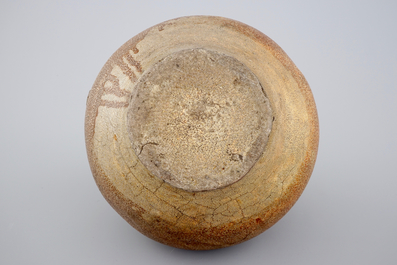 A large brown-glazed stoneware bellarmine jug, 17/18th C.