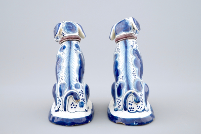 A pair of dated blue and white dogs, Harlingen, Friesland, 1752