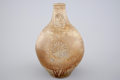 A large brown-glazed stoneware bellarmine jug, 17/18th C.