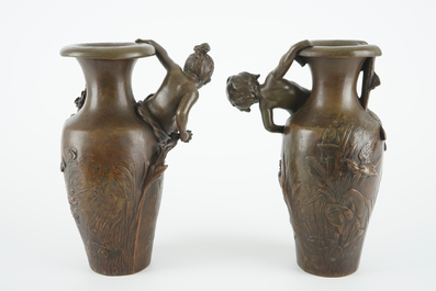 After Auguste Moreau (1834-1917), A pair of bronze Art Nouveau vases, 19/20th C.