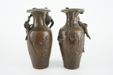 After Auguste Moreau (1834-1917), A pair of bronze Art Nouveau vases, 19/20th C.