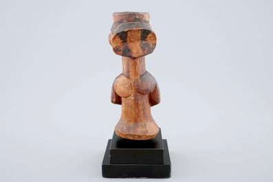 An African carved wood fetish figure on stand, Luba, Congo