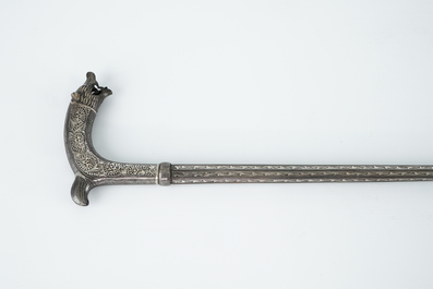 An Anglo-Indian inlaid silver cane with a dagger, 19th C.