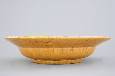 Alfred William Finch (1854 &ndash;1930): A large yellow-glazed slip-decorated ceramic dish