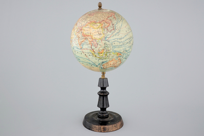 A globe on wood stand, edited by Forest in Paris, ca. 1925