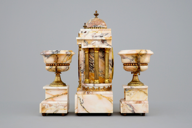 A 3-piece marble and bronze garniture, 19/20th C.