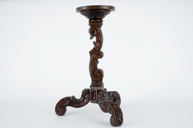 A wooden tea cabinet and a carved wood vase stand, 19/20th C.