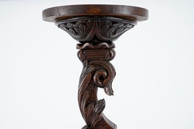 A wooden tea cabinet and a carved wood vase stand, 19/20th C.